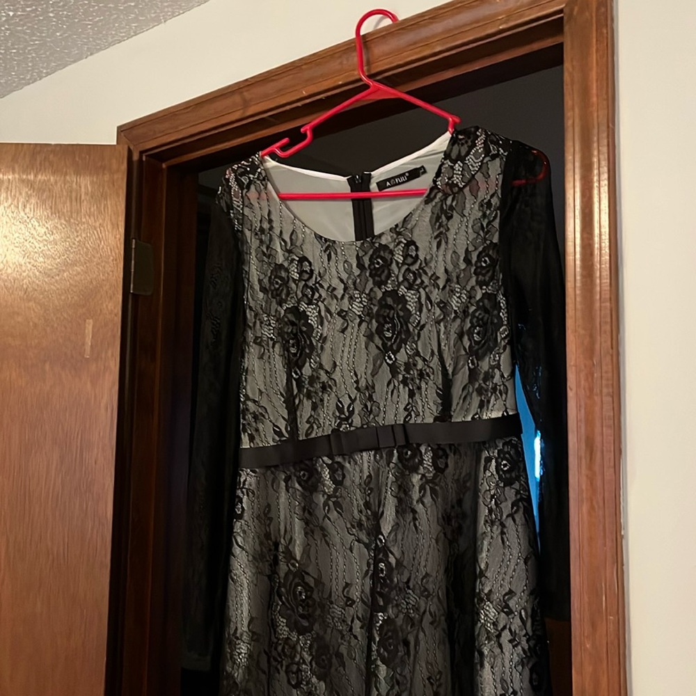 Lace overlay dress in black size large beautiful worn once.